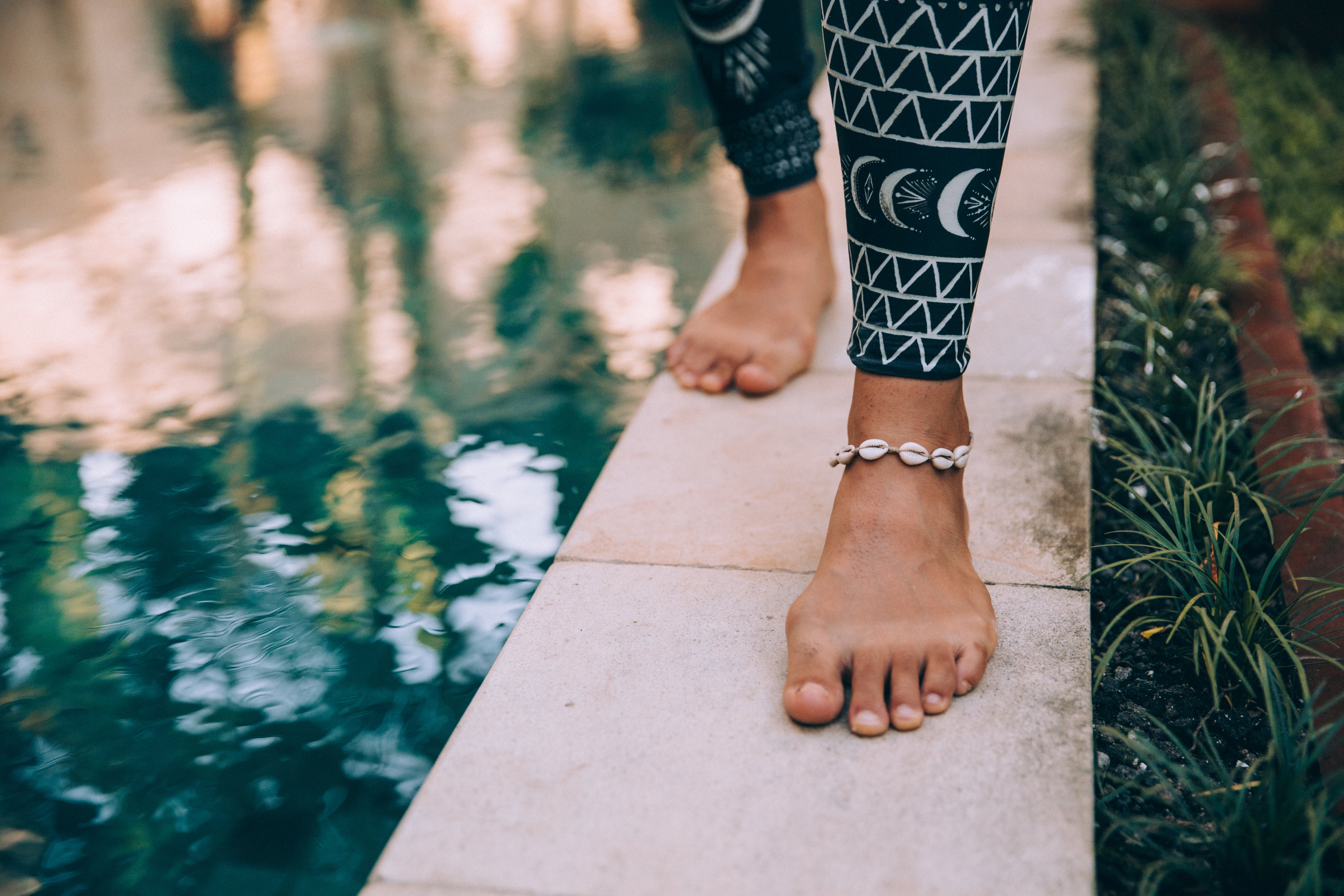 files/a-woman-walks-along-side-the-water.jpg